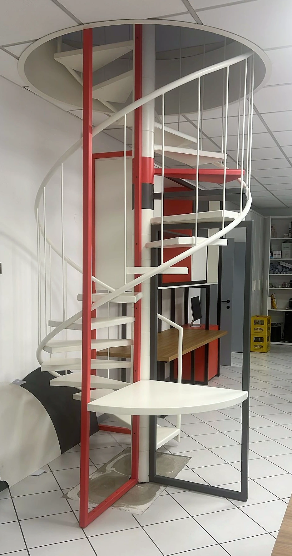 Built spiral stair and shelving: original installation photograph